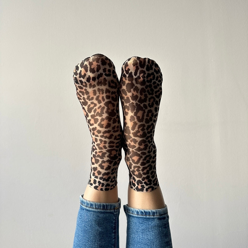 Collants noirs à imprimé léopard ultra-fins pour femmes Collants noirs à imprimé léopard ultra-fins pour femmes